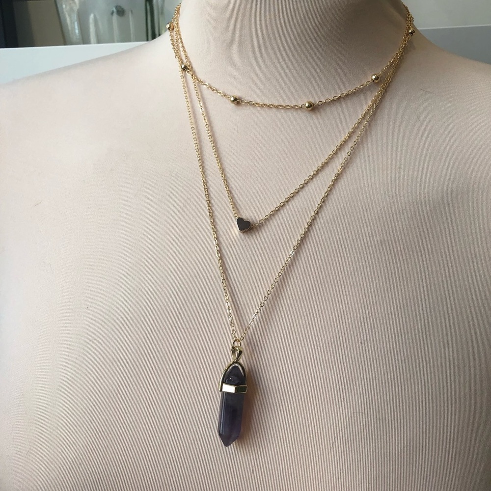 Multi layered necklace with purple glass crystal